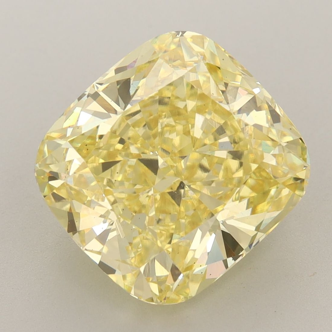 Loose Diamond - CUSHION BRILLIANT 7.3ct Fancy Vivid Yellow VS2: Loose Diamond - CUSHION BRILLIANT 7.3ct Fancy Vivid Yellow VS2 Source: This is a real non-mined Diamond that has been grown in a lab Shape: CUSHION BRILLIANT Carats: 7.3 Color: Fancy Vivid Yellow Cert