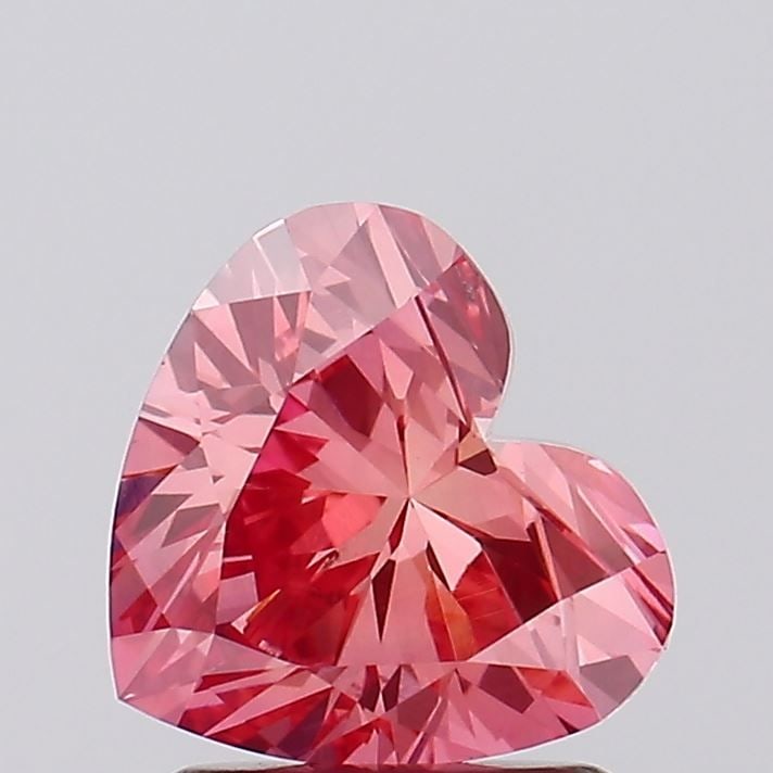 Loose Diamond - HEART 1.43ct Fancy Vivid Pink VS2: Loose Diamond - HEART 1.43ct Fancy Vivid Pink VS2 Source: This is a real non-mined Diamond that has been grown in a lab Shape: HEART Carats: 1.43 Color: Fancy Vivid Pink Certification: IGI Video: