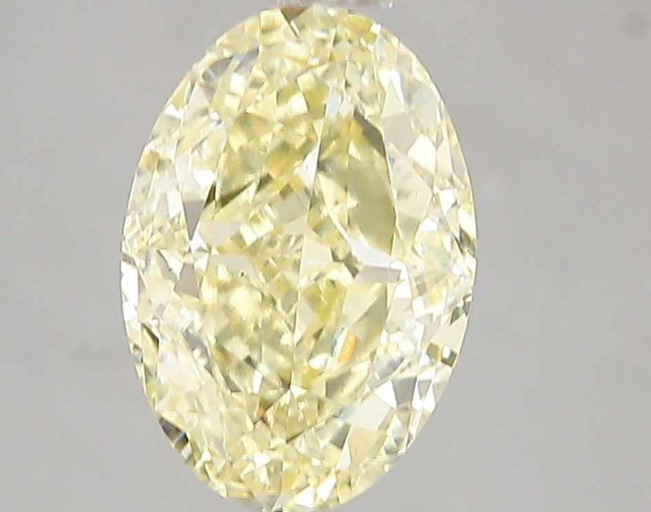 Loose Diamond - OVAL 3.01ct Fancy Vivid Yellow VS2: Loose Diamond - OVAL 3.01ct Fancy Vivid Yellow VS2 Source: This is a real non-mined Diamond that has been grown in a lab Shape: OVAL Carats: 3.01 Color: Fancy Vivid Yellow Certification: IGI Video: