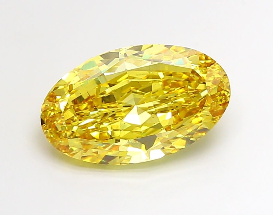 Loose Diamond - OVAL 10.08ct Fancy Vivid Yellow VS2: Loose Diamond - OVAL 10.08ct Fancy Vivid Yellow VS2 Source: This is a real non-mined Diamond that has been grown in a lab Shape: OVAL Carats: 10.08 Color: Fancy Vivid Yellow Certification: IGI Video: