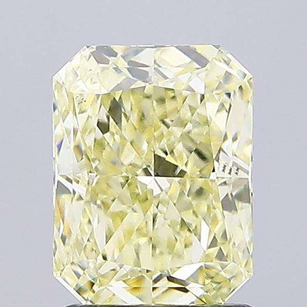 Loose Diamond - RADIANT 1.69ct Fancy Light Yellow VVS2: Loose Diamond - RADIANT 1.69ct Fancy Light Yellow VVS2 Source: This is a real non-mined Diamond that has been grown in a lab Shape: RADIANT Carats: 1.69 Color: Fancy Light Yellow Certification: IGI Vi