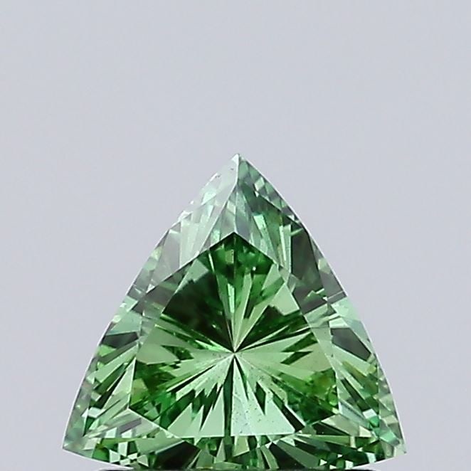 Loose Diamond - TRIANGULAR 0.67ct Fancy Vivid Green SI1: Loose Diamond - TRIANGULAR 0.67ct Fancy Vivid Green SI1 Source: This is a real non-mined Diamond that has been grown in a lab Shape: TRIANGULAR Carats: 0.67 Color: Fancy Vivid Green Certification: IGI