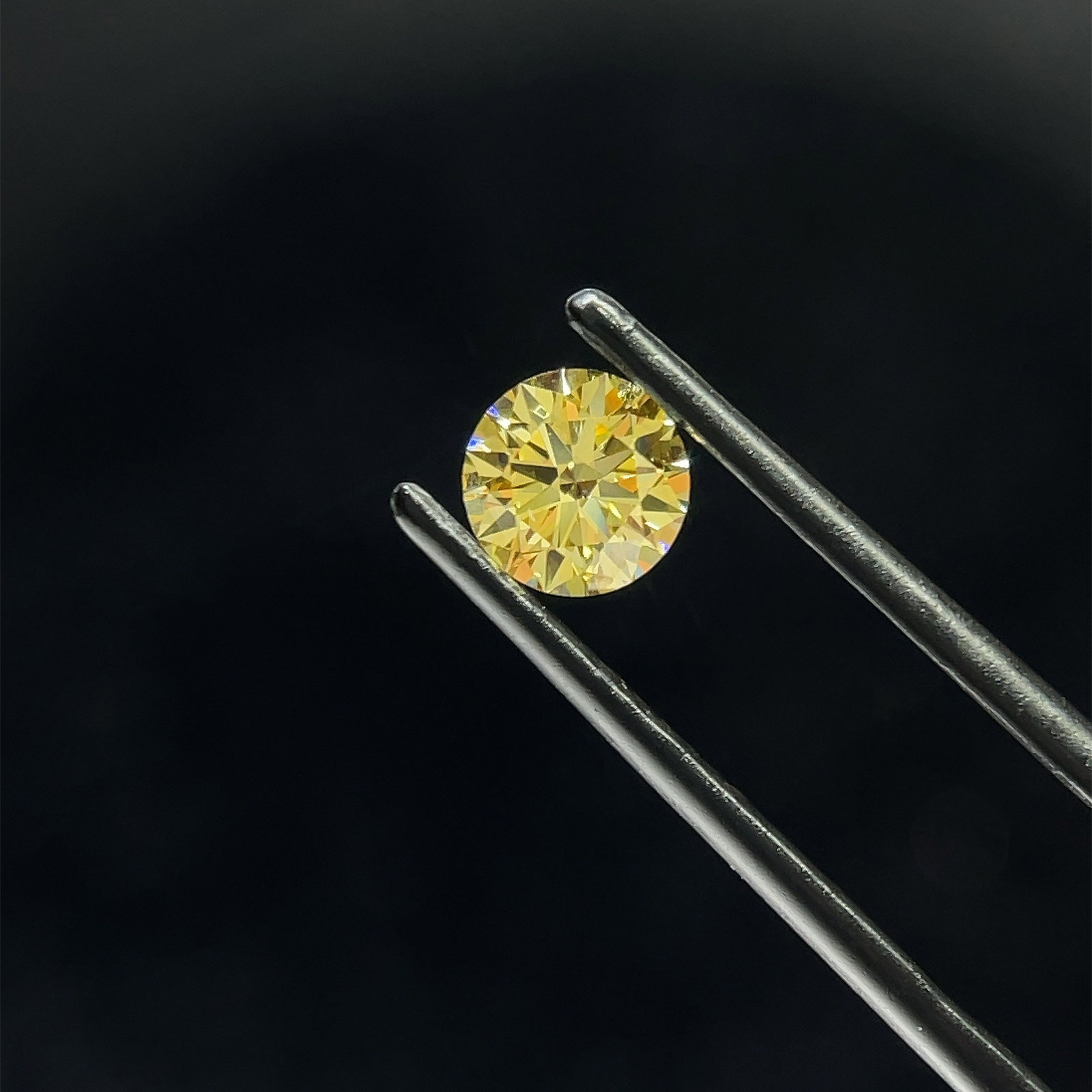 Ideal Loose Diamond - ROUND 0.7ct Fancy Intense Yellow VS2: Ideal Loose Diamond - ROUND 0.7ct Fancy Intense Yellow VS2 Source: This is a real non-mined Diamond that has been grown in a lab Shape: ROUND Carats: 0.7 Color: Fancy Intense Yellow Certification: IGI