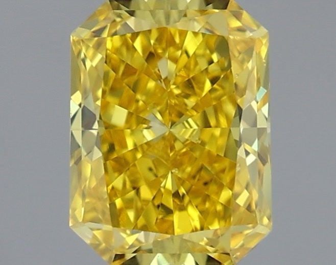 Loose Diamond - RADIANT 1.0ct Fancy Vivid Yellow VS1: Loose Diamond - RADIANT 1.0ct Fancy Vivid Yellow VS1 Source: This is a real non-mined Diamond that has been grown in a lab Shape: RADIANT Carats: 1.0 Color: Fancy Vivid Yellow Certification: IGI Video