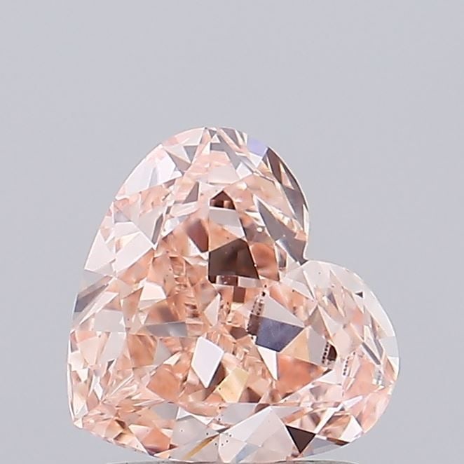 Loose Diamond - HEART 1.32ct Fancy Intense Pink VS1: Loose Diamond - HEART 1.32ct Fancy Intense Pink VS1 Source: This is a real non-mined Diamond that has been grown in a lab Shape: HEART Carats: 1.32 Color: Fancy Intense Pink Certification: IGI Video: