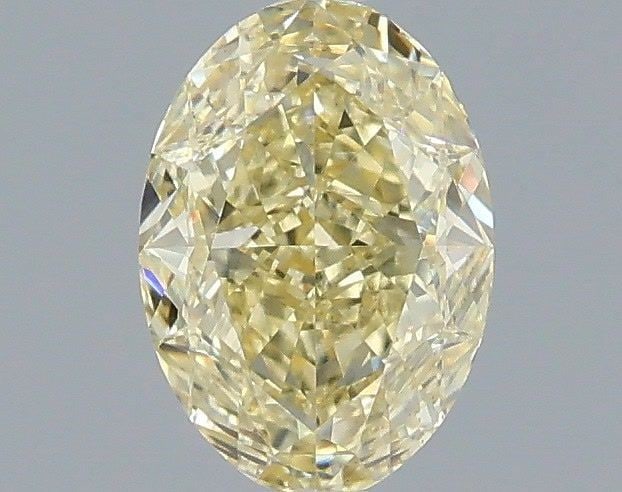 Loose Diamond - OVAL 1.03ct Fancy Yellow VS1: Loose Diamond - OVAL 1.03ct Fancy Yellow VS1 Source: This is a real non-mined Diamond that has been grown in a lab Shape: OVAL Carats: 1.03 Color: Fancy Yellow Certification: IGI PLEASE NOTE: Framed, 