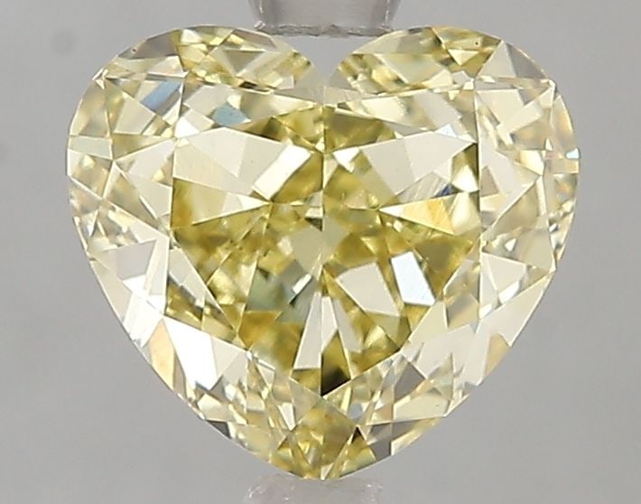 Loose Diamond - HEART 2.02ct Fancy Yellow VVS2: Loose Diamond - HEART 2.02ct Fancy Yellow VVS2 Source: This is a real non-mined Diamond that has been grown in a lab Shape: HEART Carats: 2.02 Color: Fancy Yellow Certification: IGI Video: