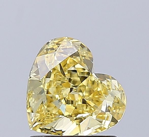 Loose Diamond - HEART 1.26ct Fancy Intense Yellow VS2: Loose Diamond - HEART 1.26ct Fancy Intense Yellow VS2 Source: This is a real non-mined Diamond that has been grown in a lab Shape: HEART Carats: 1.26 Color: Fancy Intense Yellow Certification: IGI Vid