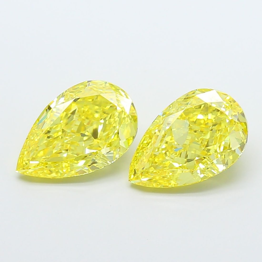 Loose Diamond - PEAR 4.15ct Fancy Vivid Yellow VVS2: Loose Diamond - PEAR 4.15ct Fancy Vivid Yellow VVS2 Source: This is a real non-mined Diamond that has been grown in a lab Shape: PEAR Carats: 4.15 Color: Fancy Vivid Yellow Certification: IGI Video: