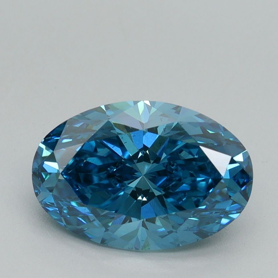Loose Diamond - OVAL 2.1ct Fancy Vivid Blue VS2: Loose Diamond - OVAL 2.1ct Fancy Vivid Blue VS2 Source: This is a real non-mined Diamond that has been grown in a lab Shape: OVAL Carats: 2.1 Color: Fancy Vivid Blue Certification: IGI Video: