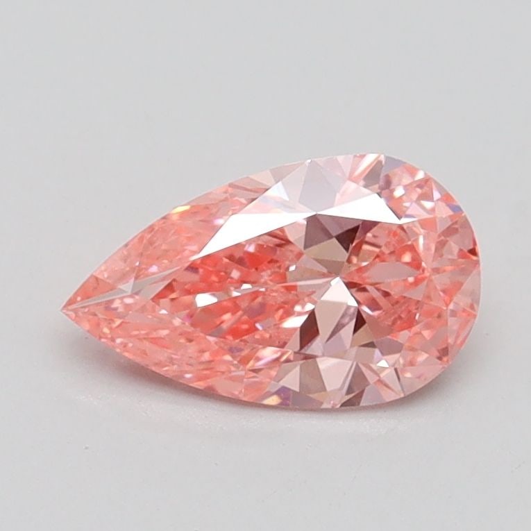 Loose Diamond - PEAR 0.7ct Fancy Vivid Pink VS1: Loose Diamond - PEAR 0.7ct Fancy Vivid Pink VS1 Source: This is a real non-mined Diamond that has been grown in a lab Shape: PEAR Carats: 0.7 Color: Fancy Vivid Pink Certification: IGI Video:
