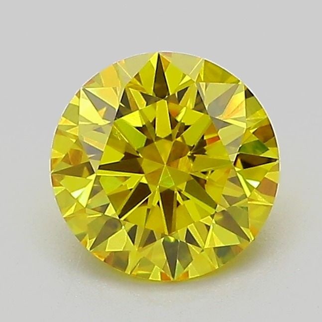 Ideal Loose Diamond - ROUND 1.05ct Fancy Vivid Yellow VS1: Ideal Loose Diamond - ROUND 1.05ct Fancy Vivid Yellow VS1 Source: This is a real non-mined Diamond that has been grown in a lab Shape: ROUND Carats: 1.05 Color: Fancy Vivid Yellow Certification: IGI V