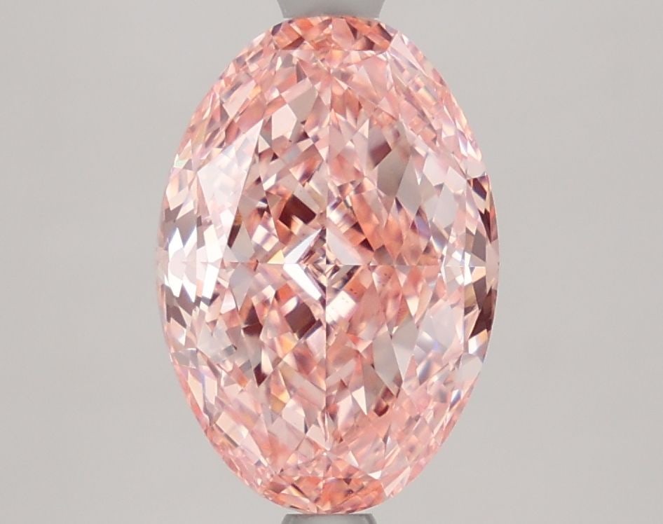 Loose Diamond - OVAL 2.88ct Fancy Vivid Pink VVS2: Loose Diamond - OVAL 2.88ct Fancy Vivid Pink VVS2 Source: This is a real non-mined Diamond that has been grown in a lab Shape: OVAL Carats: 2.88 Color: Fancy Vivid Pink Certification: IGI Video: