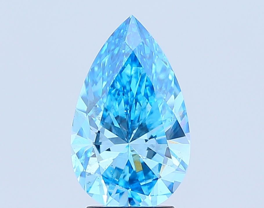 Loose Diamond - PEAR 3.01ct Fancy Vivid Blue SI1: Loose Diamond - PEAR 3.01ct Fancy Vivid Blue SI1 Source: This is a real non-mined Diamond that has been grown in a lab Shape: PEAR Carats: 3.01 Color: Fancy Vivid Blue Certification: IGI Video: