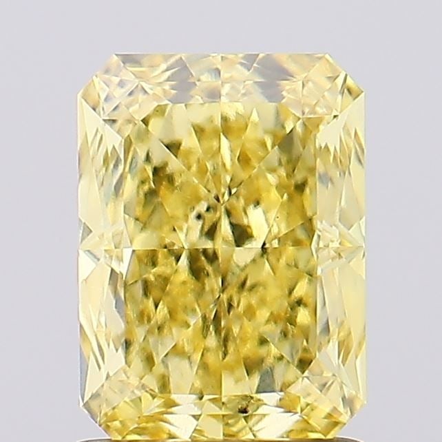 Loose Diamond - RADIANT 1.58ct Fancy Vivid Yellow VS2: Loose Diamond - RADIANT 1.58ct Fancy Vivid Yellow VS2 Source: This is a real non-mined Diamond that has been grown in a lab Shape: RADIANT Carats: 1.58 Color: Fancy Vivid Yellow Certification: IGI Vid