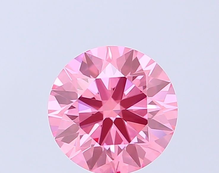 Ideal Loose Diamond - ROUND 1.01ct Fancy Vivid Pink VVS2: Ideal Loose Diamond - ROUND 1.01ct Fancy Vivid Pink VVS2 Source: This is a real non-mined Diamond that has been grown in a lab Shape: ROUND Carats: 1.01 Color: Fancy Vivid Pink Certification: IGI Vide