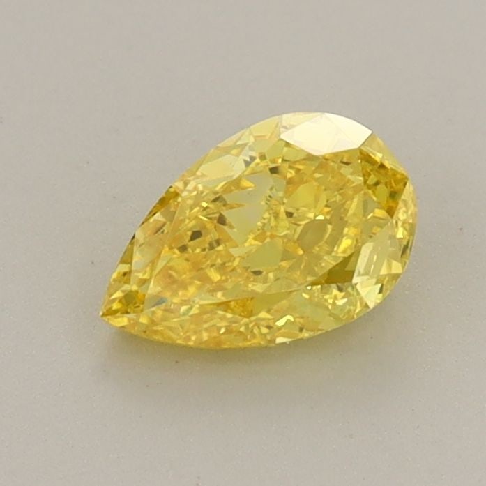 Loose Diamond - PEAR 0.61ct Fancy Vivid Yellow VS1: Loose Diamond - PEAR 0.61ct Fancy Vivid Yellow VS1 Source: This is a real non-mined Diamond that has been grown in a lab Shape: PEAR Carats: 0.61 Color: Fancy Vivid Yellow Certification: IGI Video: