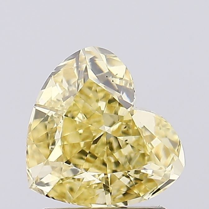 Loose Diamond - HEART 1.54ct Fancy Intense Yellow VS1: Loose Diamond - HEART 1.54ct Fancy Intense Yellow VS1 Source: This is a real non-mined Diamond that has been grown in a lab Shape: HEART Carats: 1.54 Color: Fancy Intense Yellow Certification: IGI Vid