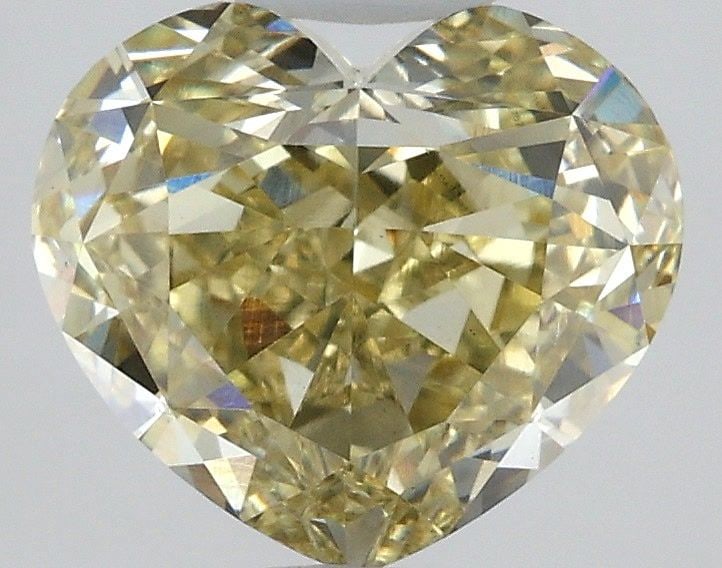 Loose Diamond - HEART 2.36ct Fancy Yellow VS1: Loose Diamond - HEART 2.36ct Fancy Yellow VS1 Source: This is a real non-mined Diamond that has been grown in a lab Shape: HEART Carats: 2.36 Color: Fancy Yellow Certification: IGI Video: