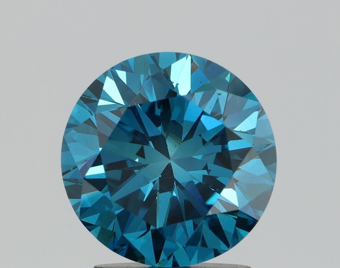 Loose Diamond - ROUND 2.15ct Fancy Blue VS2: Loose Diamond - ROUND 2.15ct Fancy Blue VS2 Source: This is a real non-mined Diamond that has been grown in a lab Shape: ROUND Carats: 2.15 Color: Fancy Blue Certification: NONE Video:
