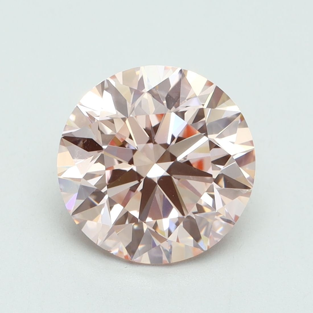 Loose Diamond - ROUND 3.24ct Fancy Intense Pink VS1: Loose Diamond - ROUND 3.24ct Fancy Intense Pink VS1 Source: This is a real non-mined Diamond that has been grown in a lab Shape: ROUND Carats: 3.24 Color: Fancy Intense Pink Certification: IGI Video: