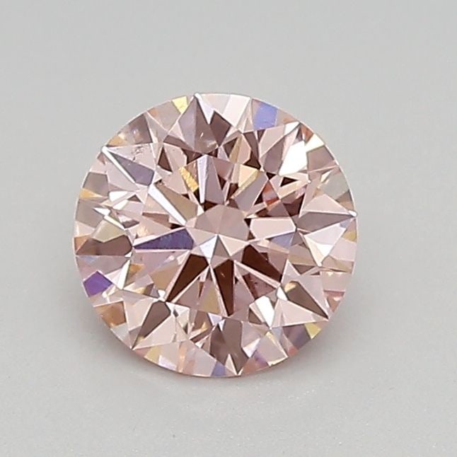 Ideal Loose Diamond - ROUND 0.67ct Fancy Vivid Pink VS2: Ideal Loose Diamond - ROUND 0.67ct Fancy Vivid Pink VS2 Source: This is a real non-mined Diamond that has been grown in a lab Shape: ROUND Carats: 0.67 Color: Fancy Vivid Pink Certification: IGI Video