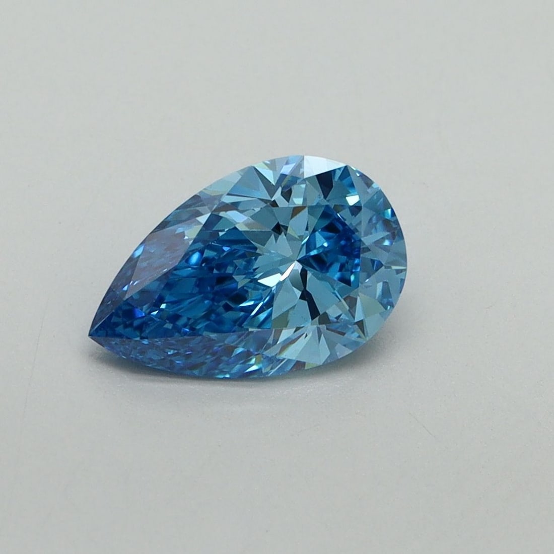 Loose Diamond - PEAR 1.06ct Fancy Vivid Blue VVS2: Loose Diamond - PEAR 1.06ct Fancy Vivid Blue VVS2 Source: This is a real non-mined Diamond that has been grown in a lab Shape: PEAR Carats: 1.06 Color: Fancy Vivid Blue Certification: IGI Video: