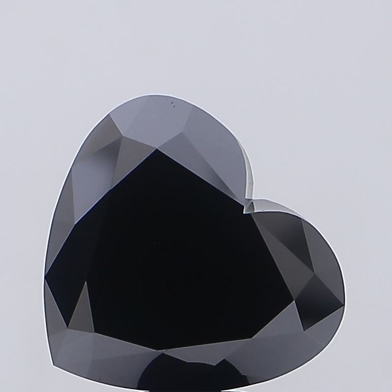 Loose Diamond - HEART 15.8ct Fancy Vivid Black VS1: Loose Diamond - HEART 15.8ct Fancy Vivid Black VS1 Source: This is a real non-mined Diamond that has been grown in a lab Shape: HEART Carats: 15.8 Color: Fancy Vivid Black Certification: NONE Video: