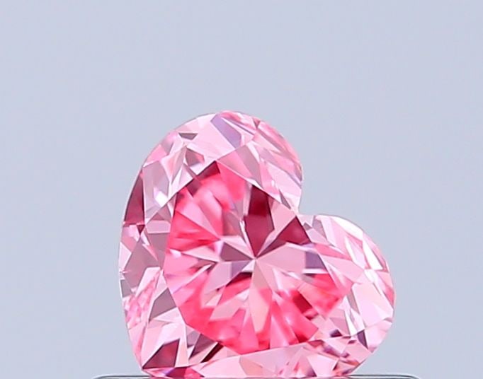 Loose Diamond - HEART 0.49ct Fancy Vivid Pink VVS2: Loose Diamond - HEART 0.49ct Fancy Vivid Pink VVS2 Source: This is a real non-mined Diamond that has been grown in a lab Shape: HEART Carats: 0.49 Color: Fancy Vivid Pink Certification: IGI Video: