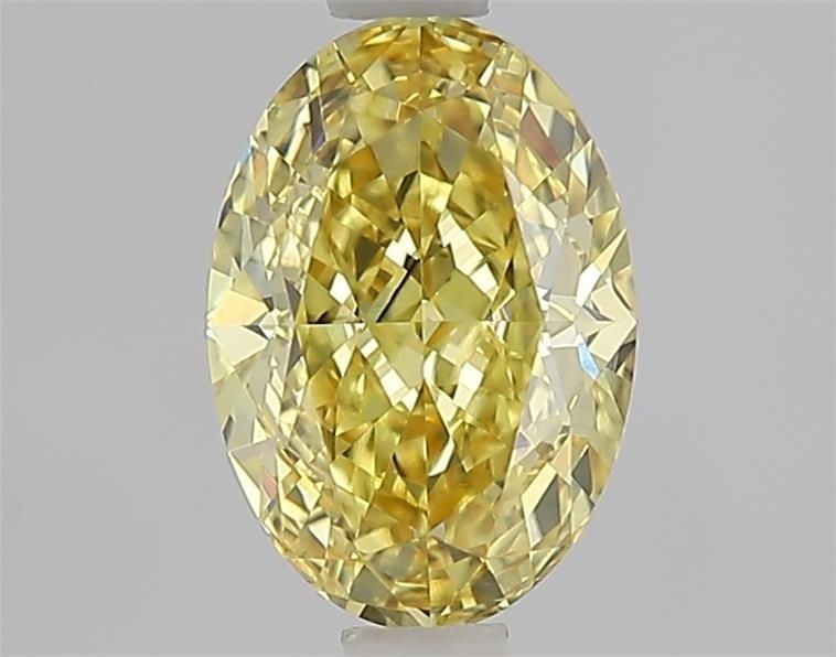 Loose Diamond - OVAL 1.55ct Fancy Vivid Yellow VS1: Loose Diamond - OVAL 1.55ct Fancy Vivid Yellow VS1 Source: This is a real non-mined Diamond that has been grown in a lab Shape: OVAL Carats: 1.55 Color: Fancy Vivid Yellow Certification: IGI Video: