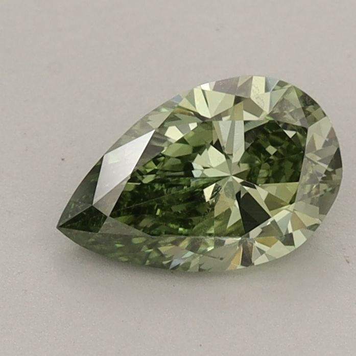 Loose Diamond - PEAR 0.84ct Fancy Vivid Green VVS2: Loose Diamond - PEAR 0.84ct Fancy Vivid Green VVS2 Source: This is a real non-mined Diamond that has been grown in a lab Shape: PEAR Carats: 0.84 Color: Fancy Vivid Green Certification: IGI Video: