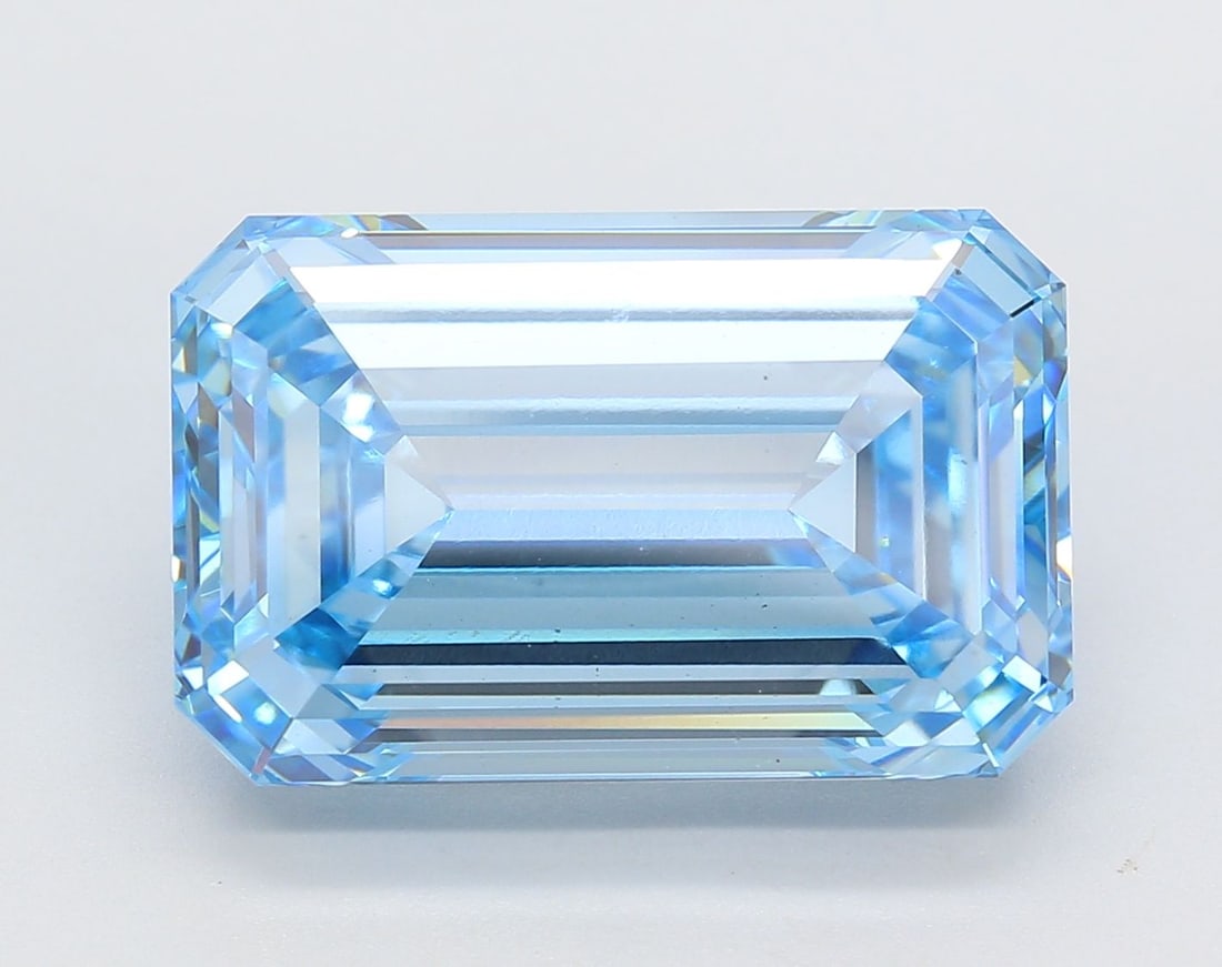 Loose Diamond - EMERALD 10.54ct Fancy Vivid Blue VS1: Loose Diamond - EMERALD 10.54ct Fancy Vivid Blue VS1 Source: This is a real non-mined Diamond that has been grown in a lab Shape: EMERALD Carats: 10.54 Color: Fancy Vivid Blue Certification: IGI Video