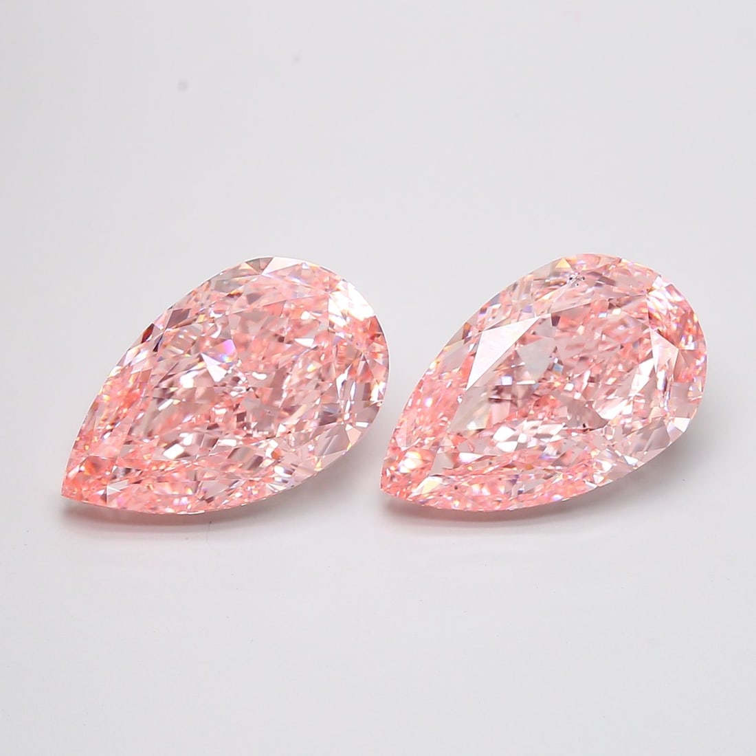 Loose Diamond - PEAR 15.54ct Fancy Intense Pink VS2: Loose Diamond - PEAR 15.54ct Fancy Intense Pink VS2 Source: This is a real non-mined Diamond that has been grown in a lab Shape: PEAR Carats: 15.54 Color: Fancy Intense Pink Certification: IGI Video: