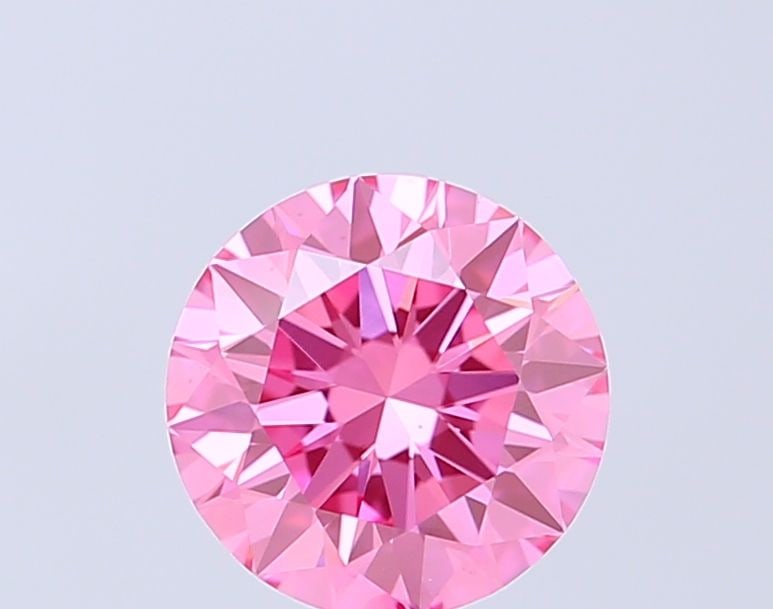 Loose Diamond - ROUND 1.0ct Fancy Vivid Pink VS1: Loose Diamond - ROUND 1.0ct Fancy Vivid Pink VS1 Source: This is a real non-mined Diamond that has been grown in a lab Shape: ROUND Carats: 1.0 Color: Fancy Vivid Pink Certification: IGI Video: