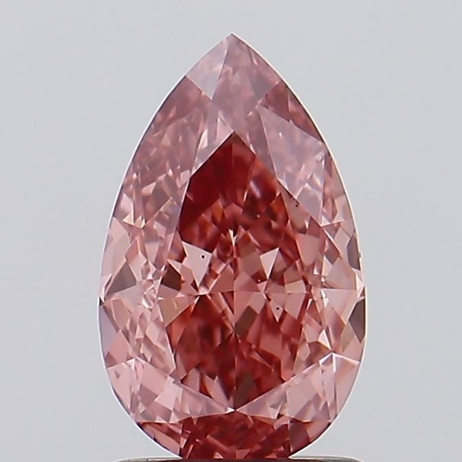 Loose Diamond - PEAR 1.6ct Fancy Vivid Pink VS2: Loose Diamond - PEAR 1.6ct Fancy Vivid Pink VS2 Source: This is a real non-mined Diamond that has been grown in a lab Shape: PEAR Carats: 1.6 Color: Fancy Vivid Pink Certification: IGI Video: