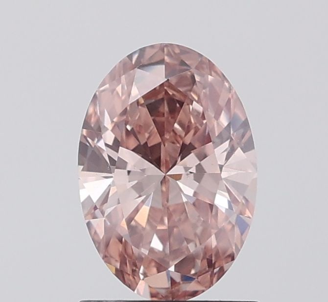 Loose Diamond - OVAL 1.06ct Fancy Pinkish Brown VS1: Loose Diamond - OVAL 1.06ct Fancy Pinkish Brown VS1 Source: This is a real non-mined Diamond that has been grown in a lab Shape: OVAL Carats: 1.06 Color: Fancy Pinkish Brown Certification: IGI Video: