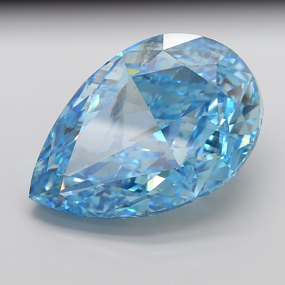 Loose Diamond - PEAR 40.05ct Fancy Vivid Blue SI1: Loose Diamond - PEAR 40.05ct Fancy Vivid Blue SI1 Source: This is a real non-mined Diamond that has been grown in a lab Shape: PEAR Carats: 40.05 Color: Fancy Vivid Blue Certification: IGI Video: