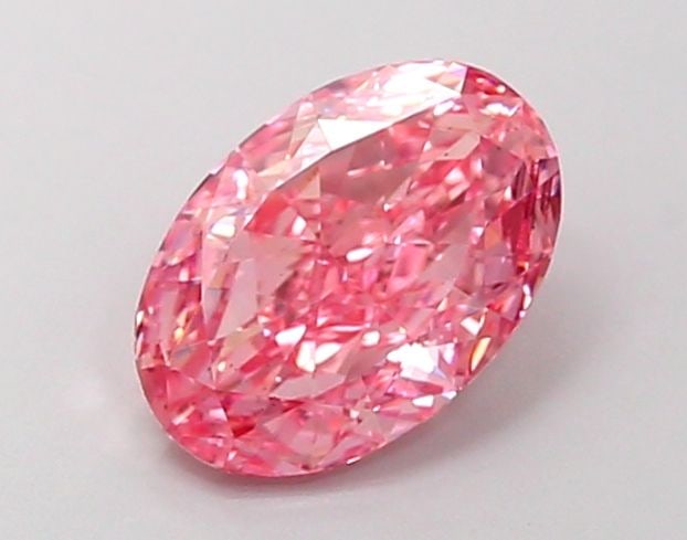 Loose Diamond - OVAL 1.54ct Fancy Vivid Pink VS2: Loose Diamond - OVAL 1.54ct Fancy Vivid Pink VS2 Source: This is a real non-mined Diamond that has been grown in a lab Shape: OVAL Carats: 1.54 Color: Fancy Vivid Pink Certification: IGI Video: