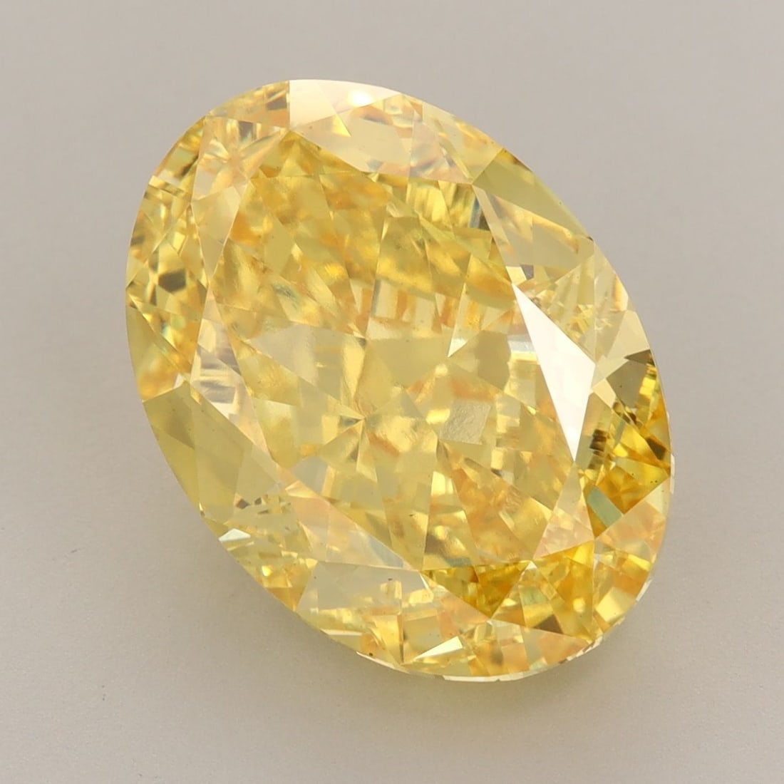 Loose Diamond - OVAL 9.01ct Fancy Vivid Yellow VS1: Loose Diamond - OVAL 9.01ct Fancy Vivid Yellow VS1 Source: This is a real non-mined Diamond that has been grown in a lab Shape: OVAL Carats: 9.01 Color: Fancy Vivid Yellow Certification: IGI Video: