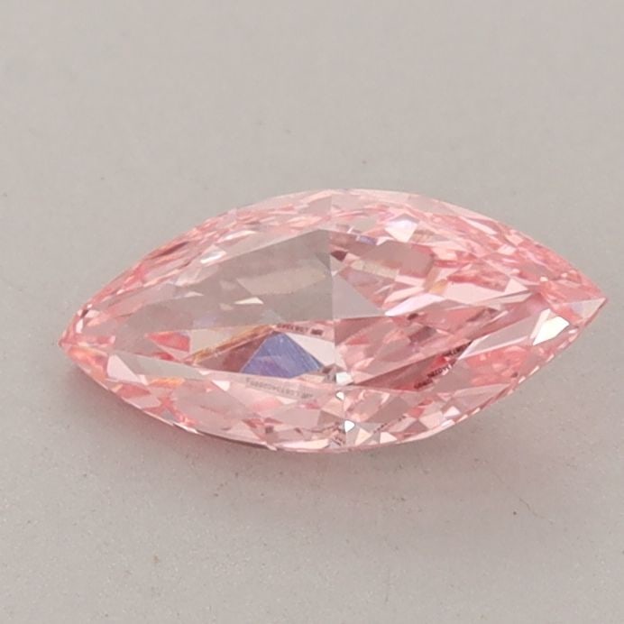 Loose Diamond - MARQUISE 0.69ct Fancy Vivid Pink VVS2: Loose Diamond - MARQUISE 0.69ct Fancy Vivid Pink VVS2 Source: This is a real non-mined Diamond that has been grown in a lab Shape: MARQUISE Carats: 0.69 Color: Fancy Vivid Pink Certification: IGI Vide