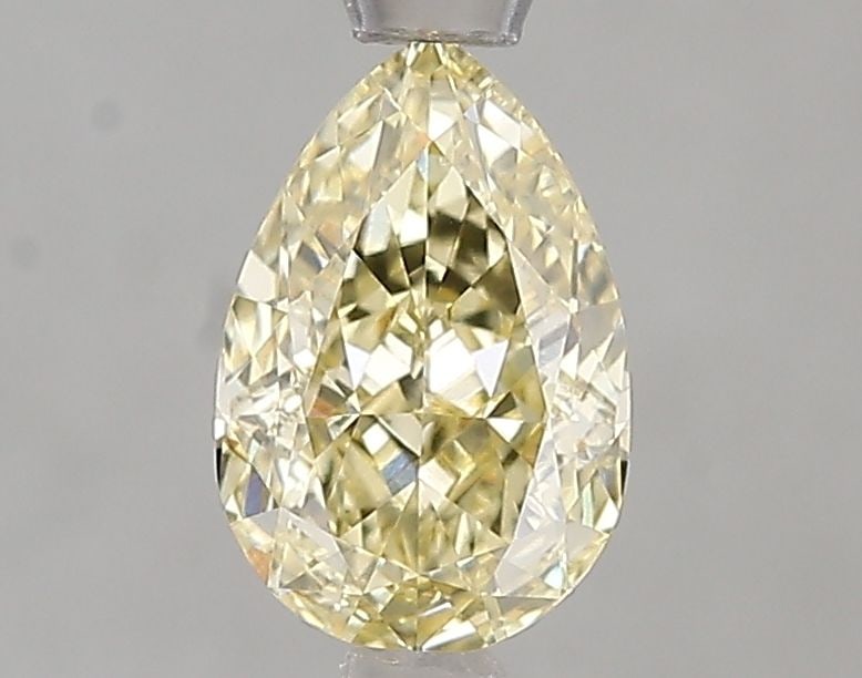 Loose Diamond - PEAR 1.08ct Fancy Yellow VS1: Loose Diamond - PEAR 1.08ct Fancy Yellow VS1 Source: This is a real non-mined Diamond that has been grown in a lab Shape: PEAR Carats: 1.08 Color: Fancy Yellow Certification: IGI Video: