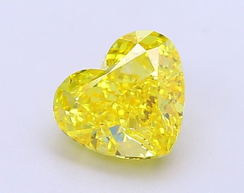 Loose Diamond - HEART 2.03ct Fancy Vivid Yellow VS1: Loose Diamond - HEART 2.03ct Fancy Vivid Yellow VS1 Source: This is a real non-mined Diamond that has been grown in a lab Shape: HEART Carats: 2.03 Color: Fancy Vivid Yellow Certification: IGI Video: