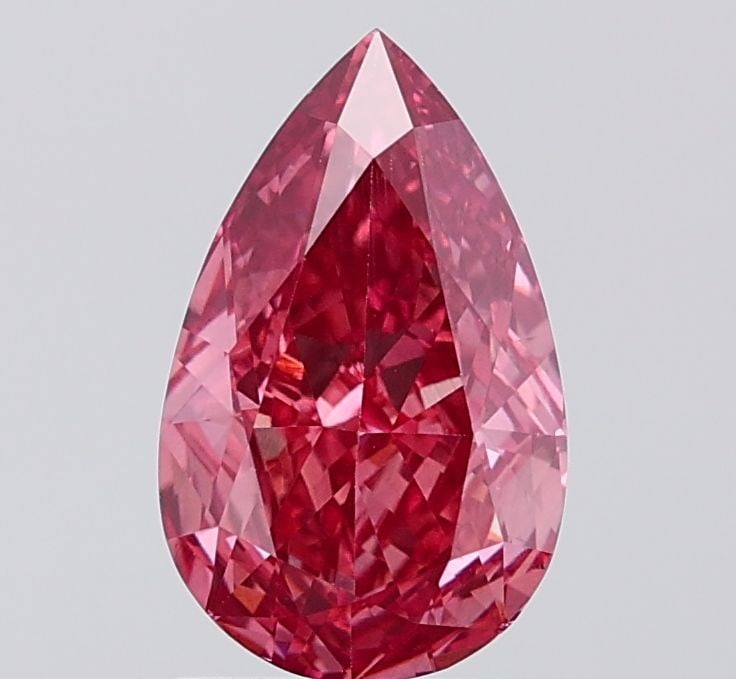 Loose Diamond - PEAR 2.05ct Fancy Vivid Pink VS1: Loose Diamond - PEAR 2.05ct Fancy Vivid Pink VS1 Source: This is a real non-mined Diamond that has been grown in a lab Shape: PEAR Carats: 2.05 Color: Fancy Vivid Pink Certification: IGI Video: