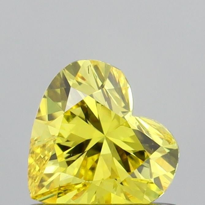 Loose Diamond - HEART 0.57ct Fancy Vivid Yellow VS2: Loose Diamond - HEART 0.57ct Fancy Vivid Yellow VS2 Source: This is a real non-mined Diamond that has been grown in a lab Shape: HEART Carats: 0.57 Color: Fancy Vivid Yellow Certification: IGI Video: