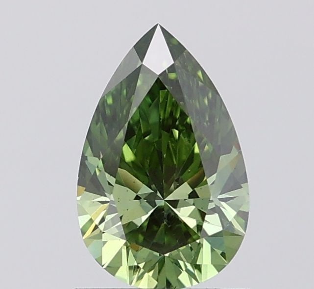 Loose Diamond - PEAR 0.99ct Fancy Vivid Green VS1: Loose Diamond - PEAR 0.99ct Fancy Vivid Green VS1 Source: This is a real non-mined Diamond that has been grown in a lab Shape: PEAR Carats: 0.99 Color: Fancy Vivid Green Certification: IGI Video: