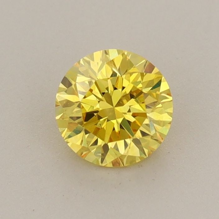 Loose Diamond - ROUND 0.56ct Fancy Vivid Yellow SI1: Loose Diamond - ROUND 0.56ct Fancy Vivid Yellow SI1 Source: This is a real non-mined Diamond that has been grown in a lab Shape: ROUND Carats: 0.56 Color: Fancy Vivid Yellow Certification: IGI PLEASE 