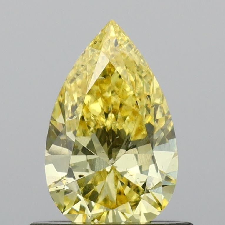 Loose Diamond - PEAR 0.69ct Fancy Intense Yellow SI2: Loose Diamond - PEAR 0.69ct Fancy Intense Yellow SI2 Source: This is a real non-mined Diamond that has been grown in a lab Shape: PEAR Carats: 0.69 Color: Fancy Intense Yellow Certification: IGI Video