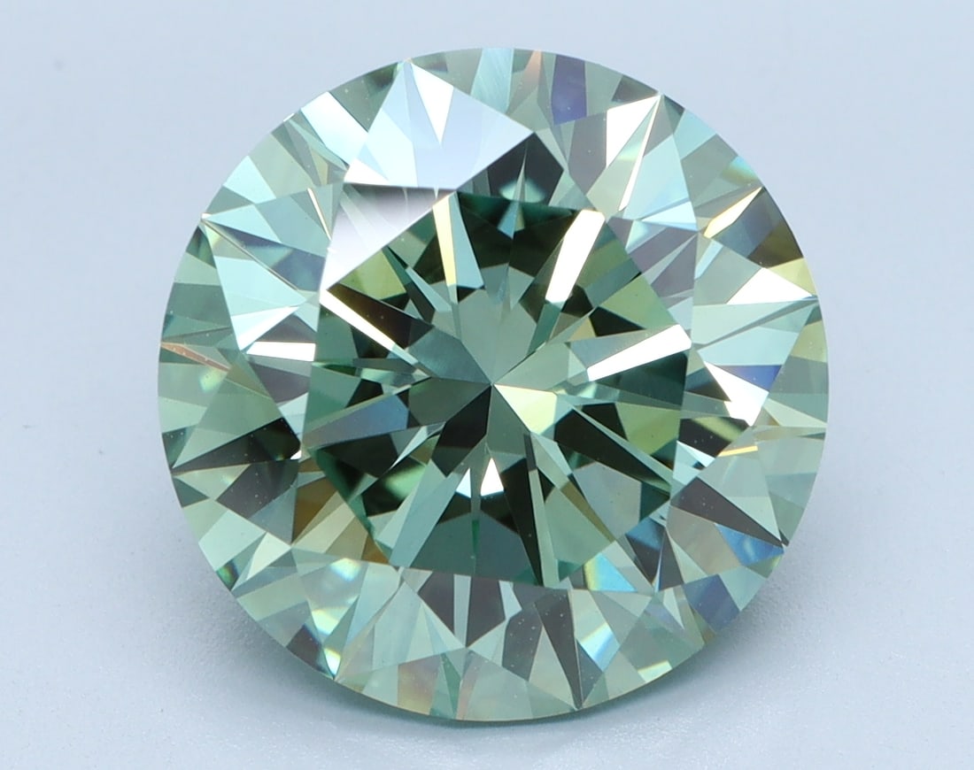 Loose Diamond - Round 5.46ct GREEN VVS2: Loose Diamond - Round 5.46ct GREEN VVS2 Source: This is a real non-mined Diamond that has been grown in a lab Shape: Round Carats: 5.46 Color: GREEN Clarity: VVS2 Certification: IGI Condition: Pre-Own