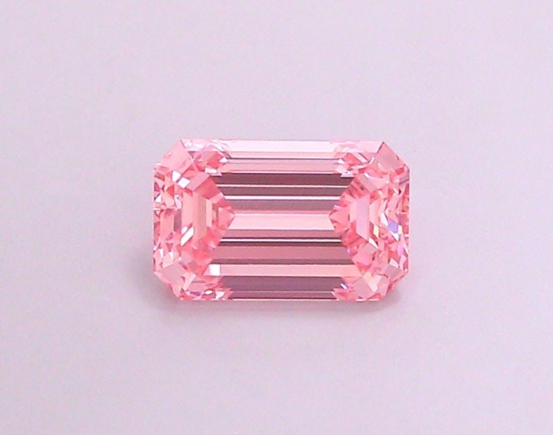 Loose Diamond - EMERALD 1.26ct Fancy Vivid Pink VVS2: Loose Diamond - EMERALD 1.26ct Fancy Vivid Pink VVS2 Source: This is a real non-mined Diamond that has been grown in a lab Shape: EMERALD Carats: 1.26 Color: Fancy Vivid Pink Certification: IGI Video: