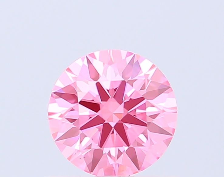 Ideal Loose Diamond - ROUND 0.7ct Fancy Vivid Pink VS1: Ideal Loose Diamond - ROUND 0.7ct Fancy Vivid Pink VS1 Source: This is a real non-mined Diamond that has been grown in a lab Shape: ROUND Carats: 0.7 Color: Fancy Vivid Pink Certification: IGI Video: